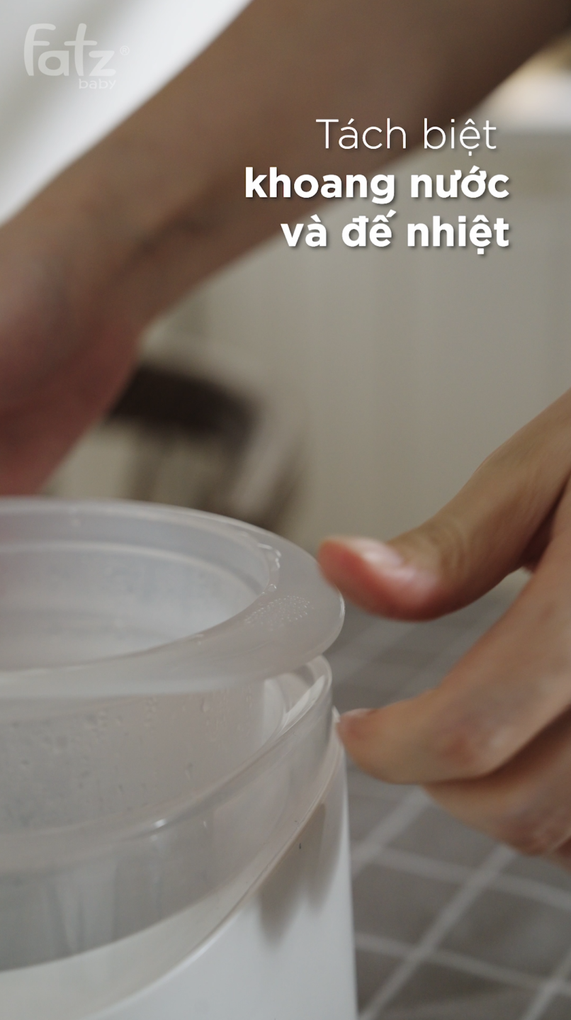 máy hâm sữa siêu tốc thông minh mono 18